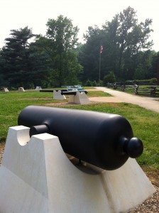 A variety of artillery pieces and siege guns arrayed in front of the visitors center